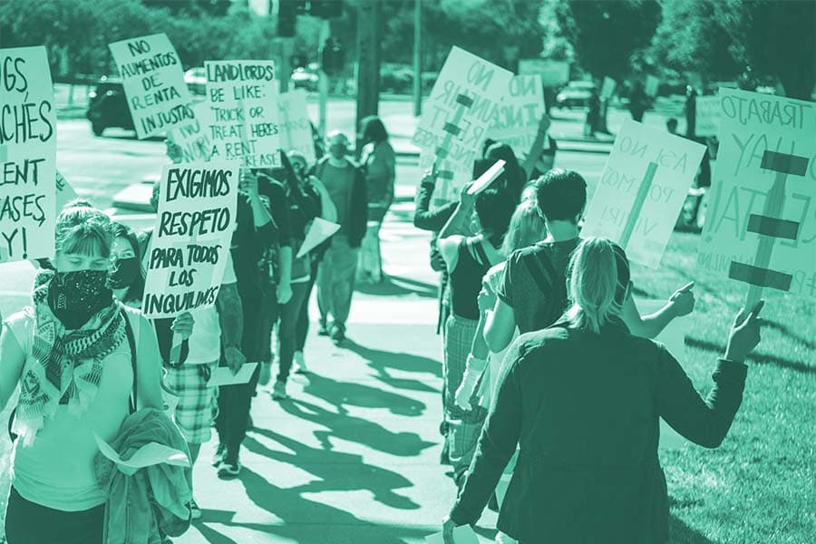 A placeholder image of a group of people holding signs