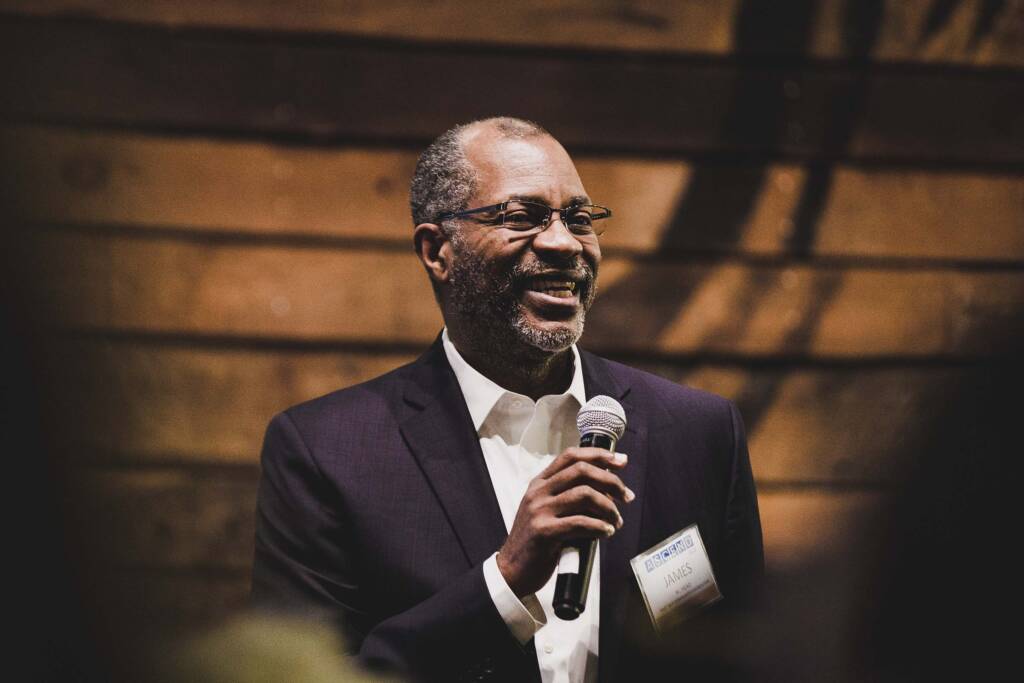 James W. Head speaking at an event