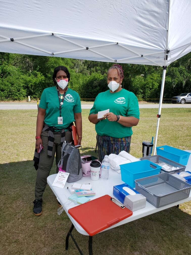 Two woman at a vaccination center