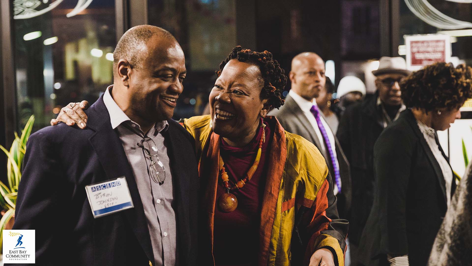 People talking at a networking event