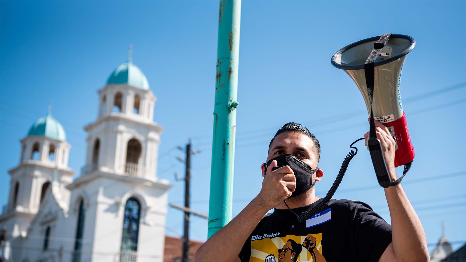 A man speaking into a megaphone