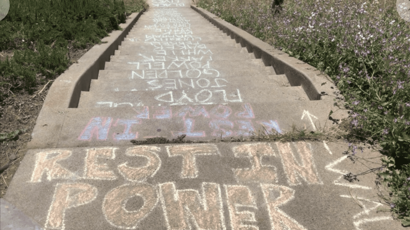 Concrete stairs with chalk writing on them